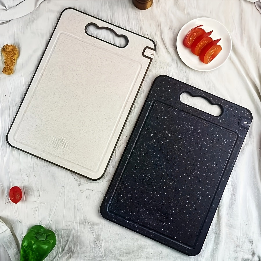 Planche à découper en inox à poignée